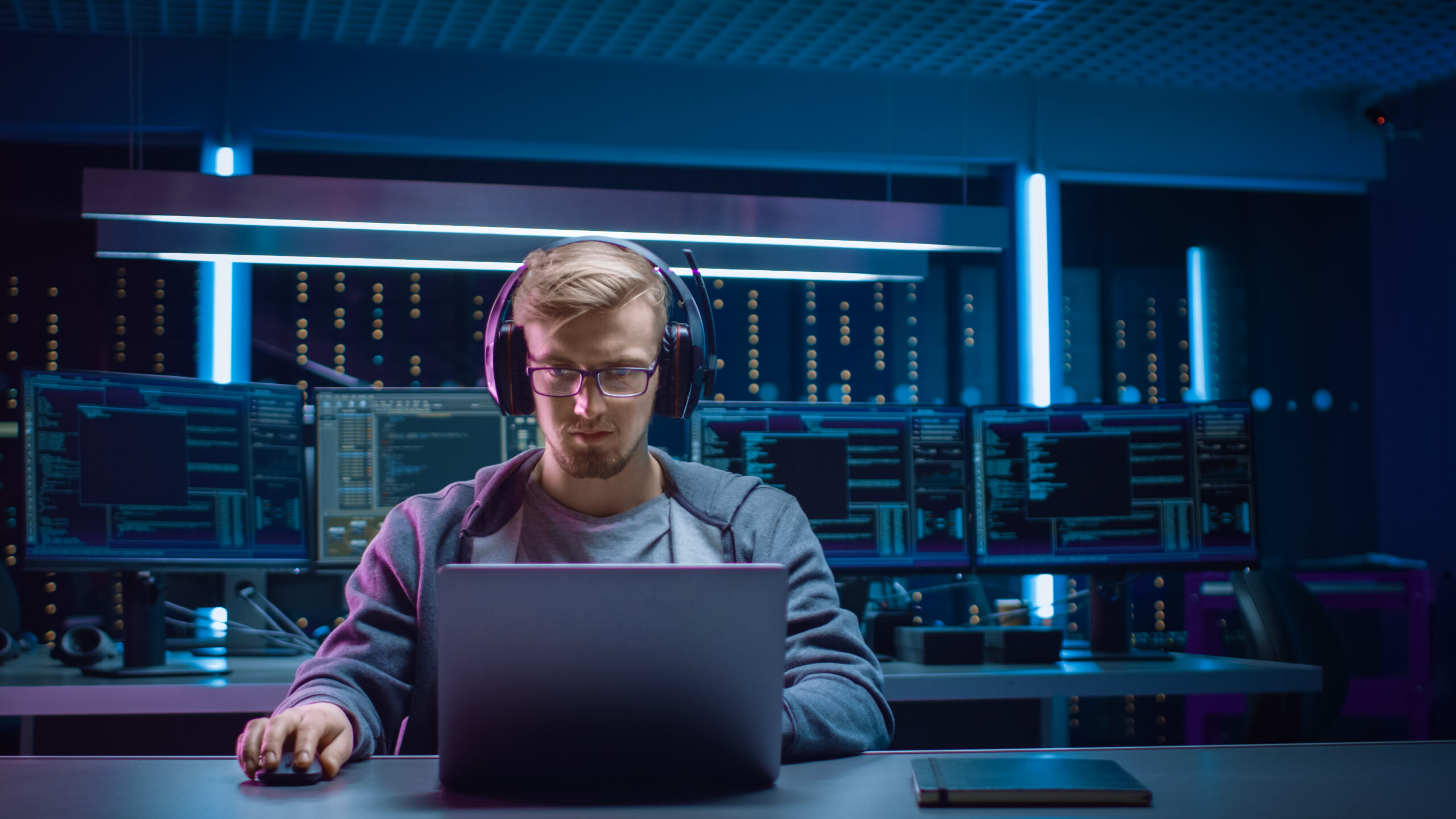 Analyst developing AI system in secure environment Analyst developing AI system in secure environment
